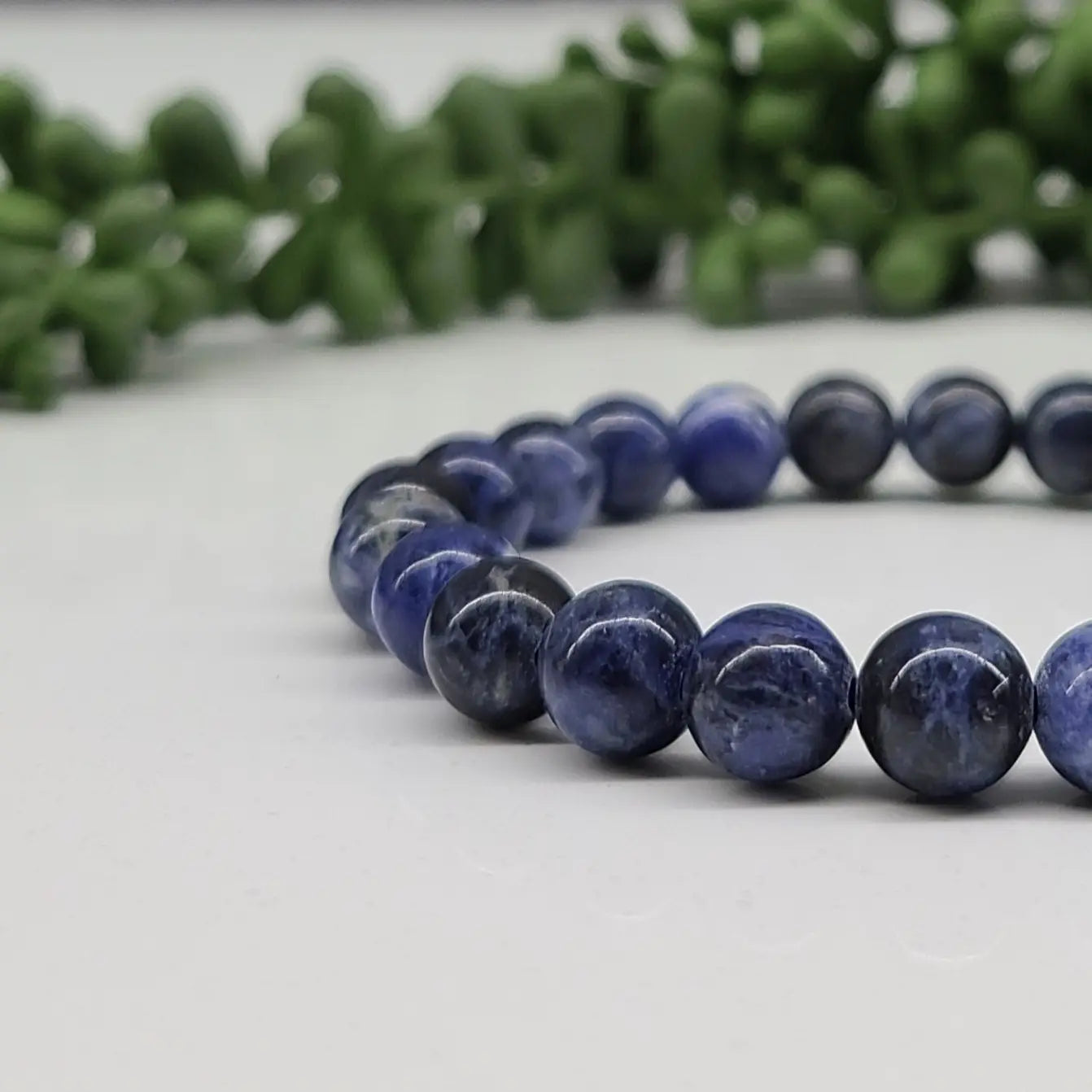 Sodalite Smooth Bead Stretch Bracelet Close Up View