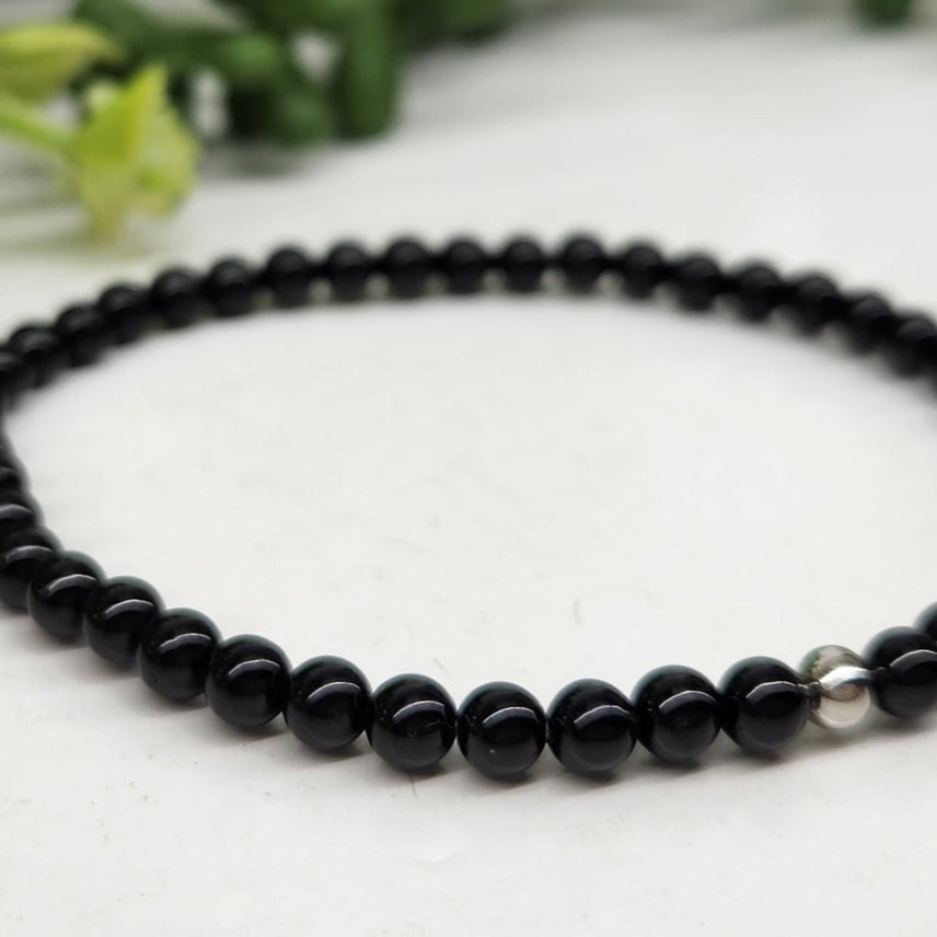 Obsidian Black 6mm Smooth Bead Stretch Bracelet White Background