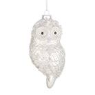 Decorative owl ornament with a white and silver finish on a white background
