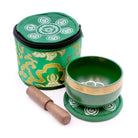 Green Heart Chakra Metal Singing Bowl nestled in a Green Silk Case