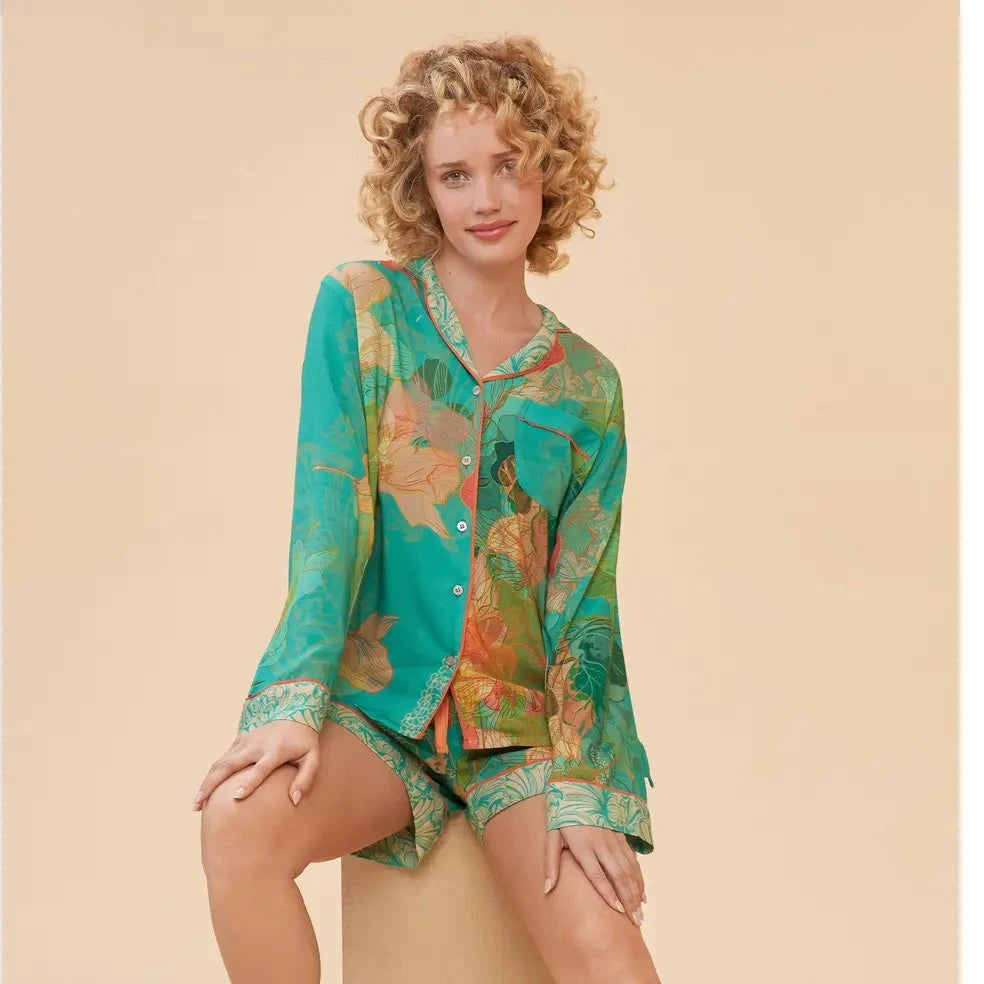 Hummingbird Pajamas in Aqua Model Sitting