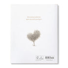 Product packaging with a heart-shaped tree design and text on a white background
