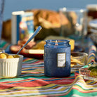 Voluspa Mediterranean Lemon Small Jar Candle 5.5 oz on table