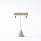 Emerald Cut Faceted Moldavite Earrings on Earring Stand