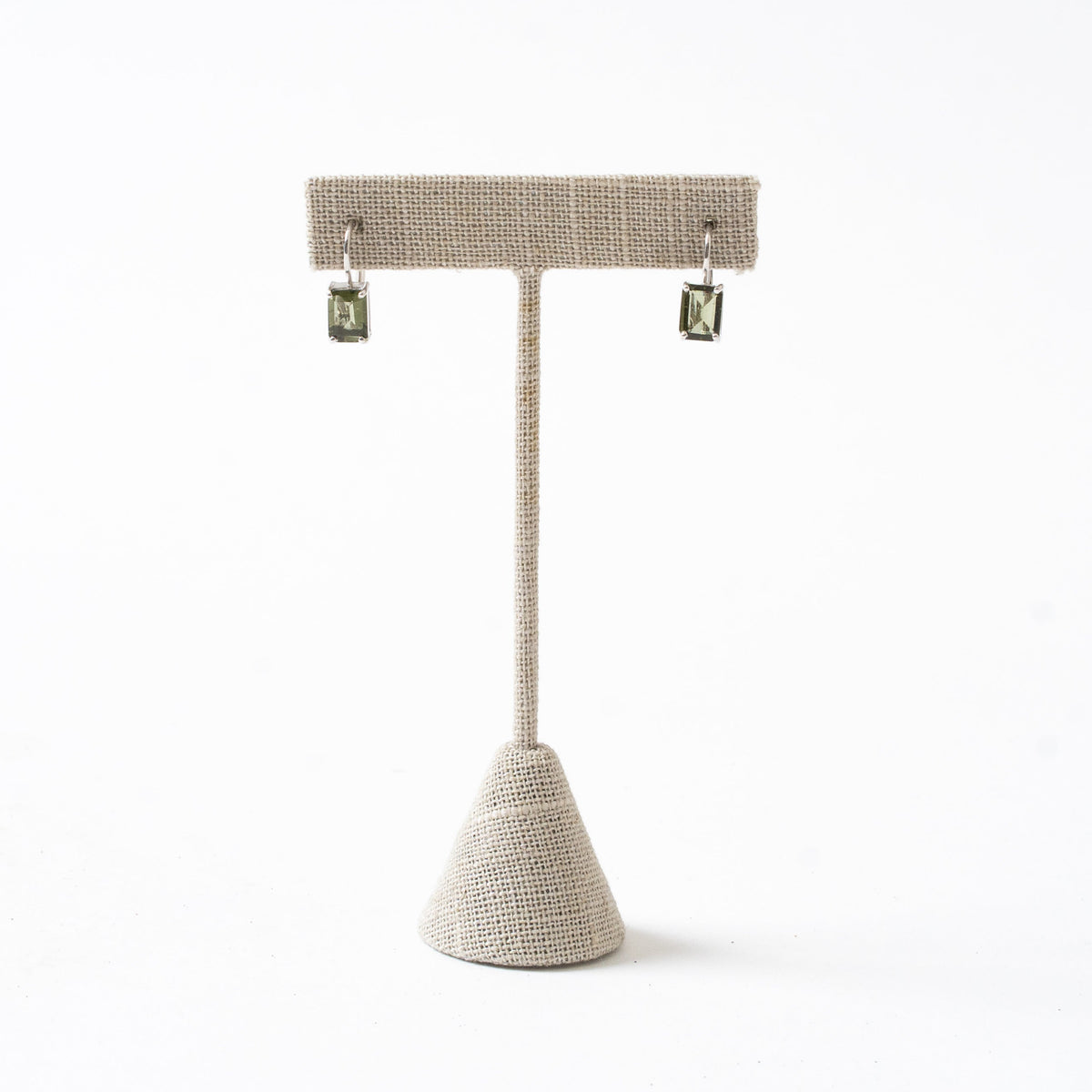 Emerald Cut Faceted Moldavite Earrings on Earring Stand