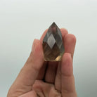 Smoky Quartz Faceted Crystal Pear Shape in Hand