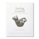Book titled 'Feeling Grateful' with a bear illustration on a white background