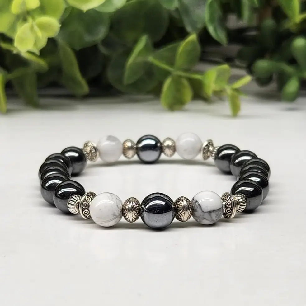 Calmness & Grounding Howlite & Hematite Smooth Bead Stretch Bracelet with plant