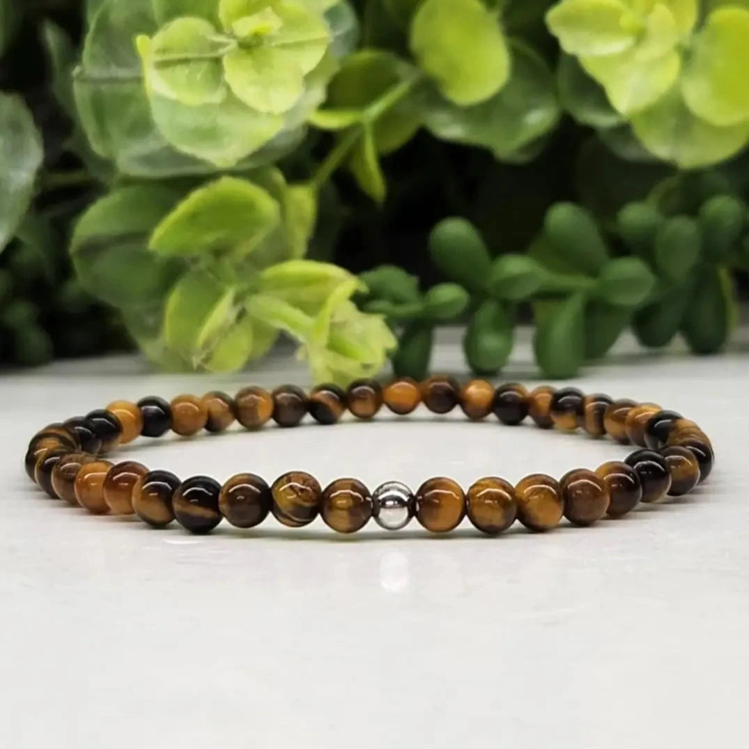 Tiger Eye Smooth Bead Stretch Bracelet 4mm on white background