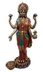Colorful statue of a deity with traditional attire on a white background