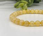 Citrine 6mm Smooth Bead Stretch Bracelet closer view