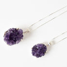 Purple Amethyst crystal hair pins on white background