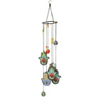 Decorative wind chime with colorful designs on a white background