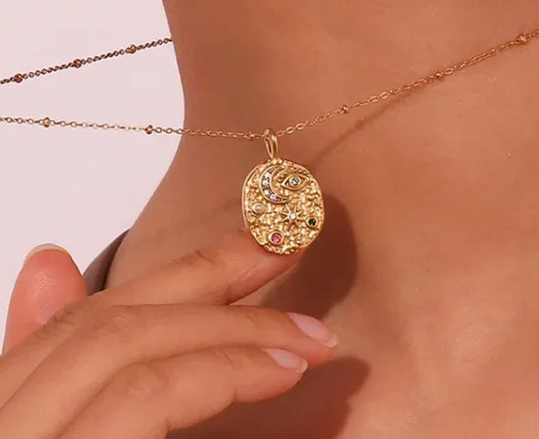 Cosmic Evil Eye Necklace with Moon and Stars for Protection and Guidance on Neck
