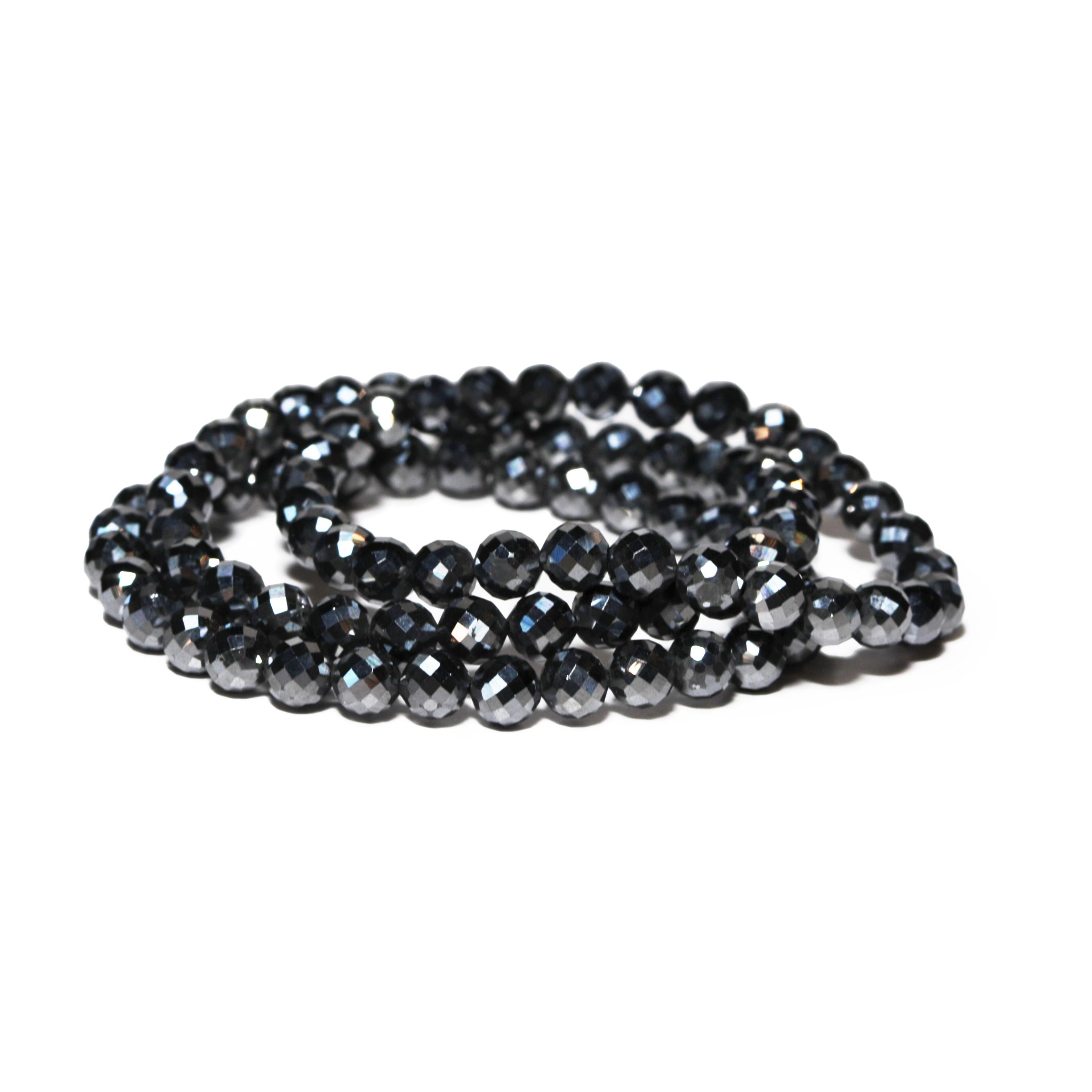 Black hematite beaded bracelets on a white background