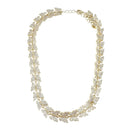 A gold-toned butterfly shaped chain necklace embellished with clear cubic zirconia displayed against a solid white background.