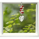 Ruby Crystal Hearts Cascade Sun Catcher in Window