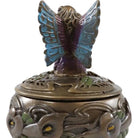 Decorative incense burner with butterfly design on a white background