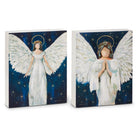 Two square canvas wall art prints showing angel figures with large white wings against a dark blue starry night background, displayed on a white studio background.