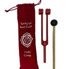 Red tuning fork with black handle and red pouch labeled 'Tuning Fork Root Chakra' on a white background