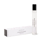 Archipelago Charcoal Rose perfume oil bottle and packaging on a white background