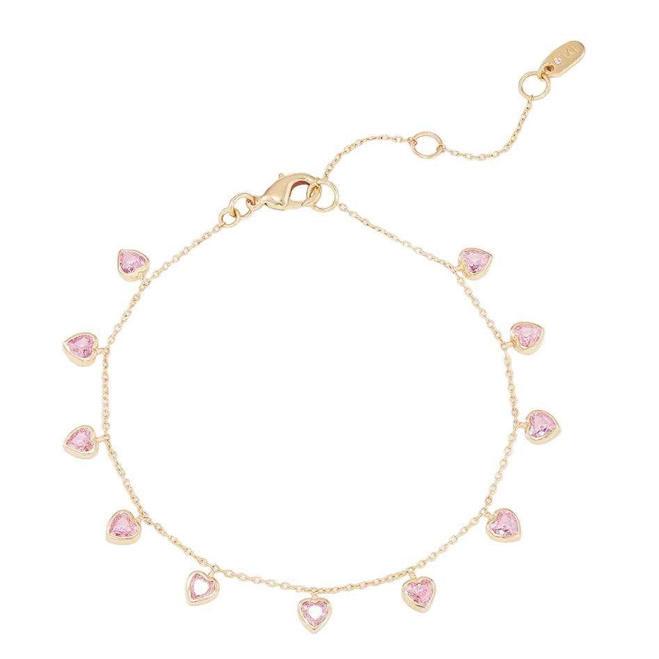Gold bracelet or anklet with pink heart-shaped charms on a white background