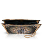 A dark blue beaded clutch bag with gold chain straps and a large circular blue and gold central medallion, shown open on a white background.