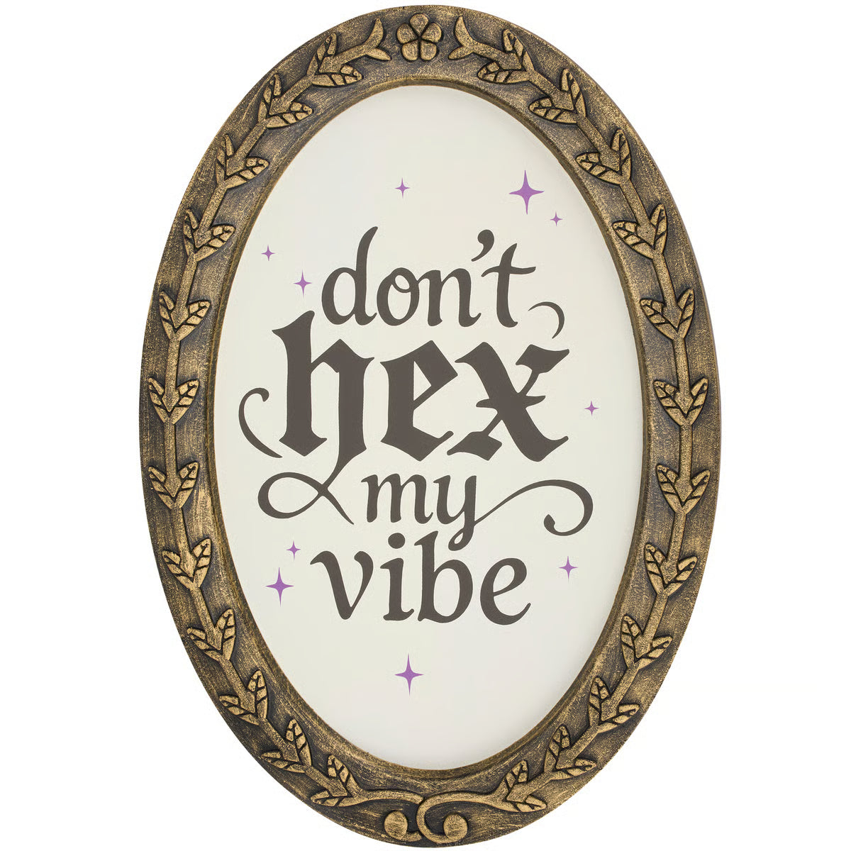 Oval wall art with an ornate antique gold frame and the phrase 'don't hex my vibe' in dark gray script on a white background, accented with small purple sparkles.