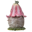 Decorative garden gnome with a pink flower-like hat on a white background