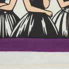 Close-up of a textile product showing a black-and-white graphic print of dancers' lower bodies with a wide purple horizontal stripe across the middle on an off-white fabric background.