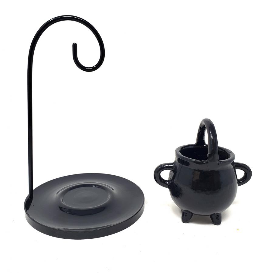Black metal stand with a curved arm and black ceramic cauldron on a white background