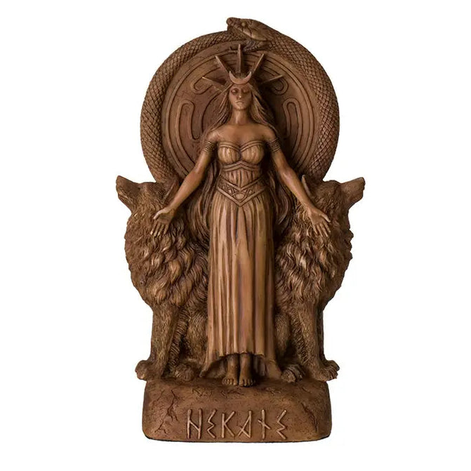 Bronze statue of a  Hecate Goddess with two wolves on a white background
