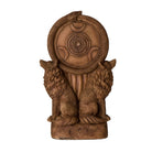 Wooden sculpture of two wolves flanking a circular emblem with a design on a white background