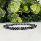Hematite 4mm Smooth Bead Stretch Bracelet Far View On White