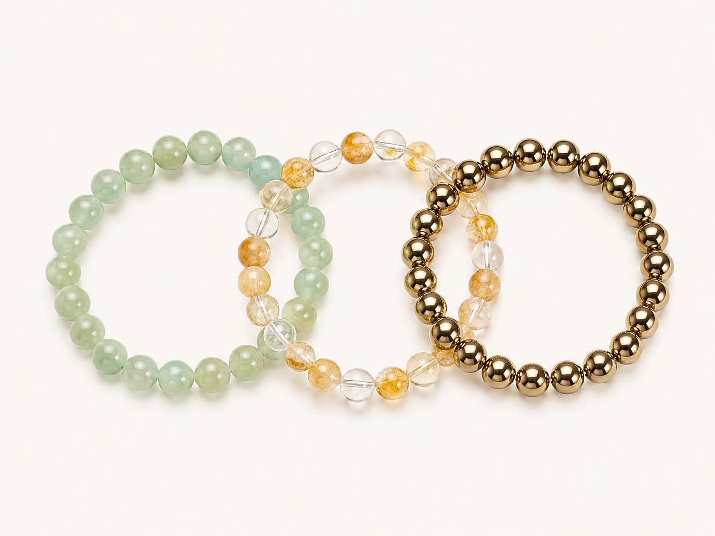 Three beaded bracelets Aventurine, pyrite, citrine on a white background