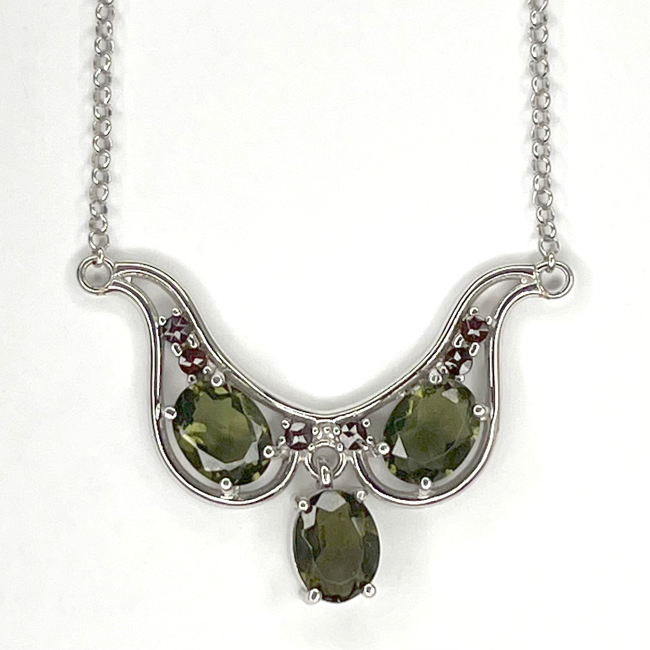 Moldavite Oval Cut Trio and Garnet Accent Necklace