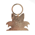 Back of Black Cat with Wings keychain on a white background