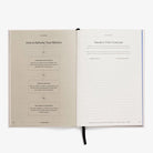 Open book with text on a white background