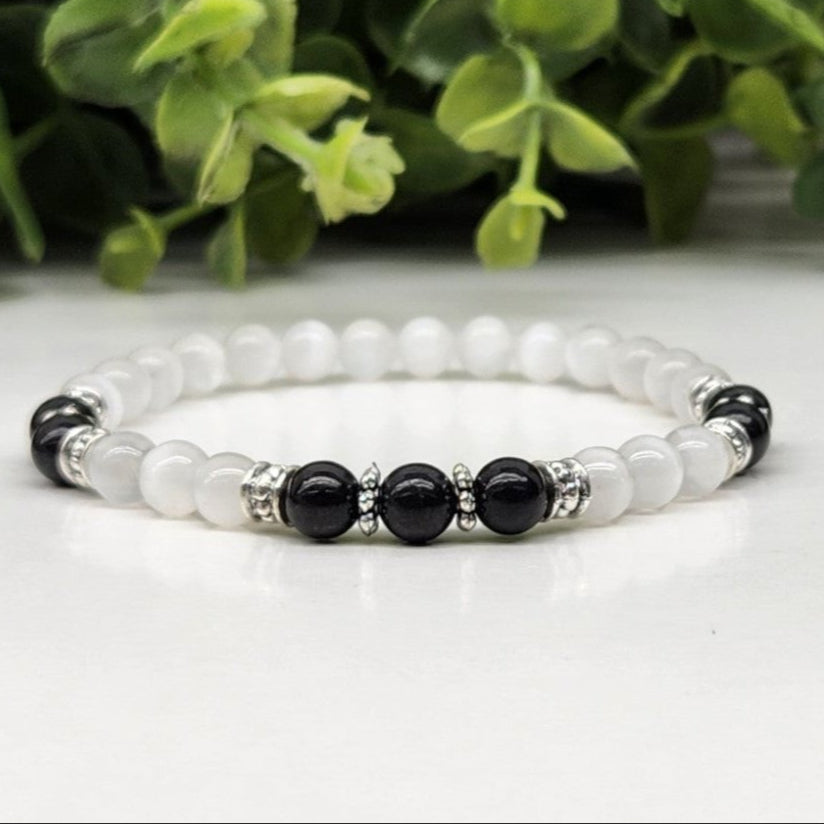 Shungite and Selenite Smooth Bead Protection Bracelet with Silver Spacers on White