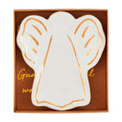 White ceramic angel wing dish with gold accents in a brown box