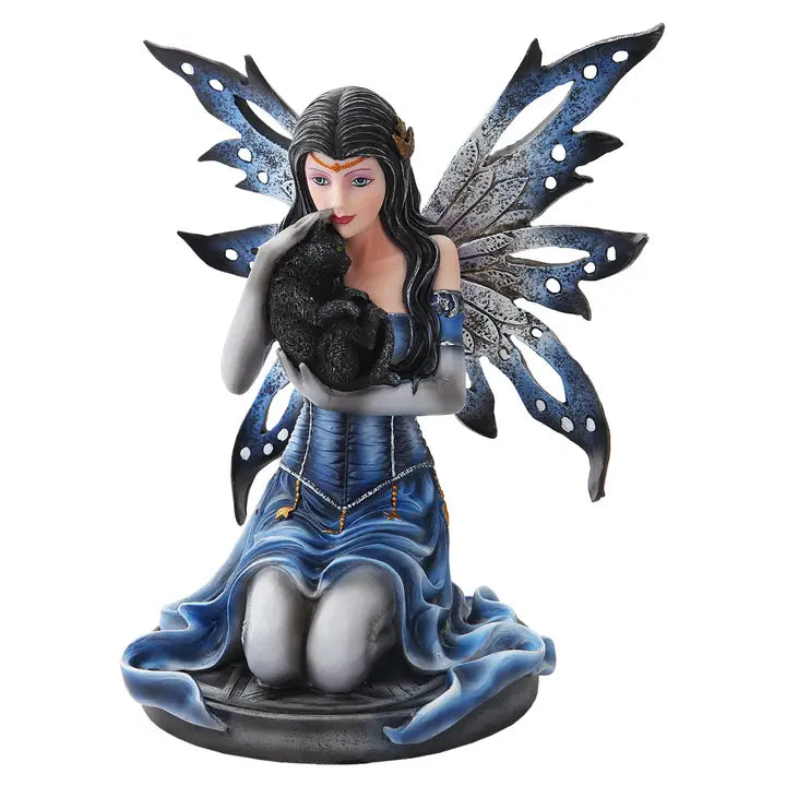Fairy figurine with blue and black wings and dress on a white background