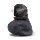 A plush penguin hat with a dark gray felted wool neck warmer and a black plush penguin head, shown from the back on a white background.