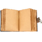 Open vintage book with worn pages on a white background