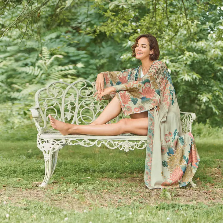 Lady on bench showing Coconut beige Trailing Wisteria Kimono Gown