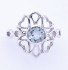 Surrounded by Love Faceted Aquamarine Ring wiith Sterling Silver Heart Accents