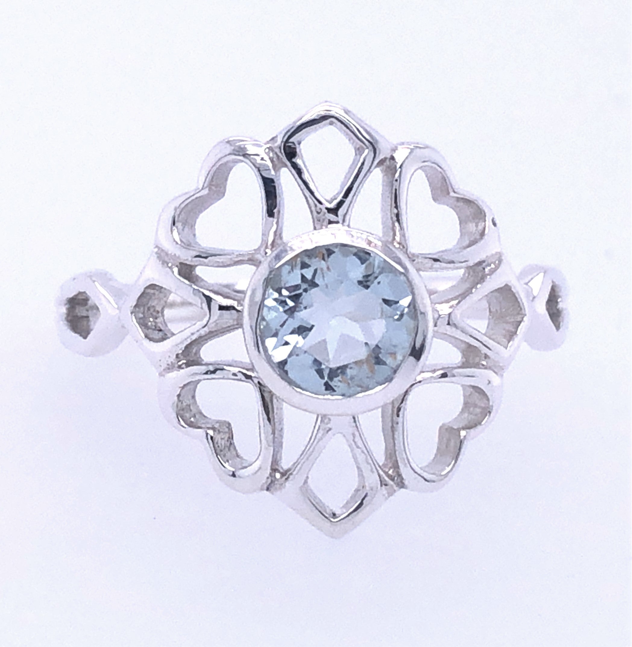 Surrounded by Love Faceted Aquamarine Ring wiith Sterling Silver Heart Accents