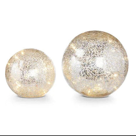 Two decorative glass spheres that Light Up on white background