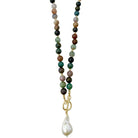 A beaded gemstone necklace featuring a gradient of colorful round beads transitioning from dark green to light pink, with a gold-tone clasp and a dangling white baroque pearl, shown on a plain white background.