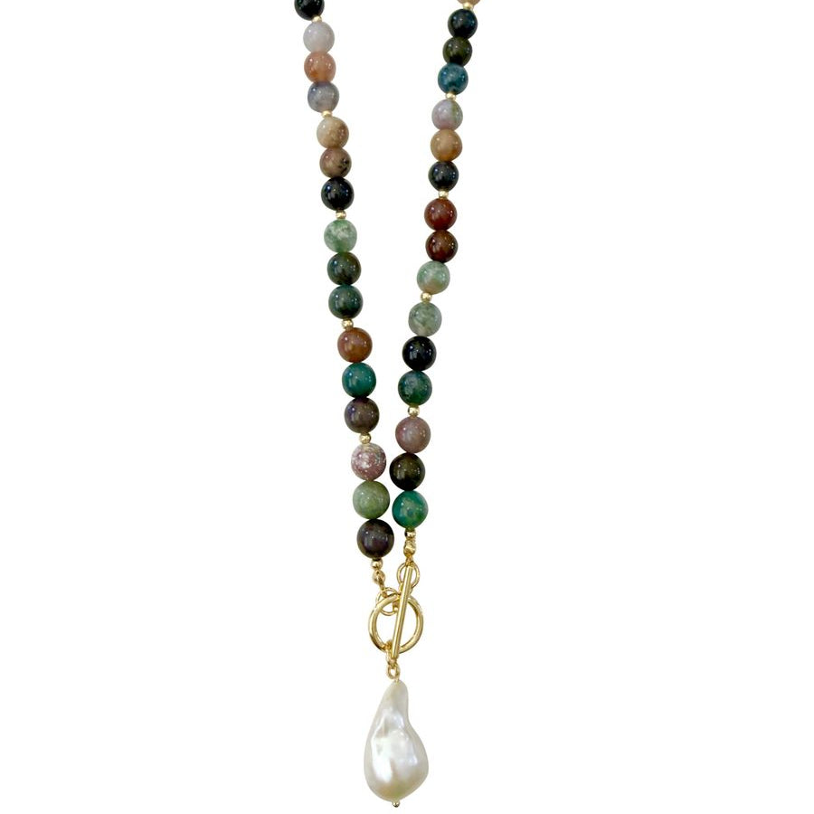 A beaded gemstone necklace featuring a gradient of colorful round beads transitioning from dark green to light pink, with a gold-tone clasp and a dangling white baroque pearl, shown on a plain white background.
