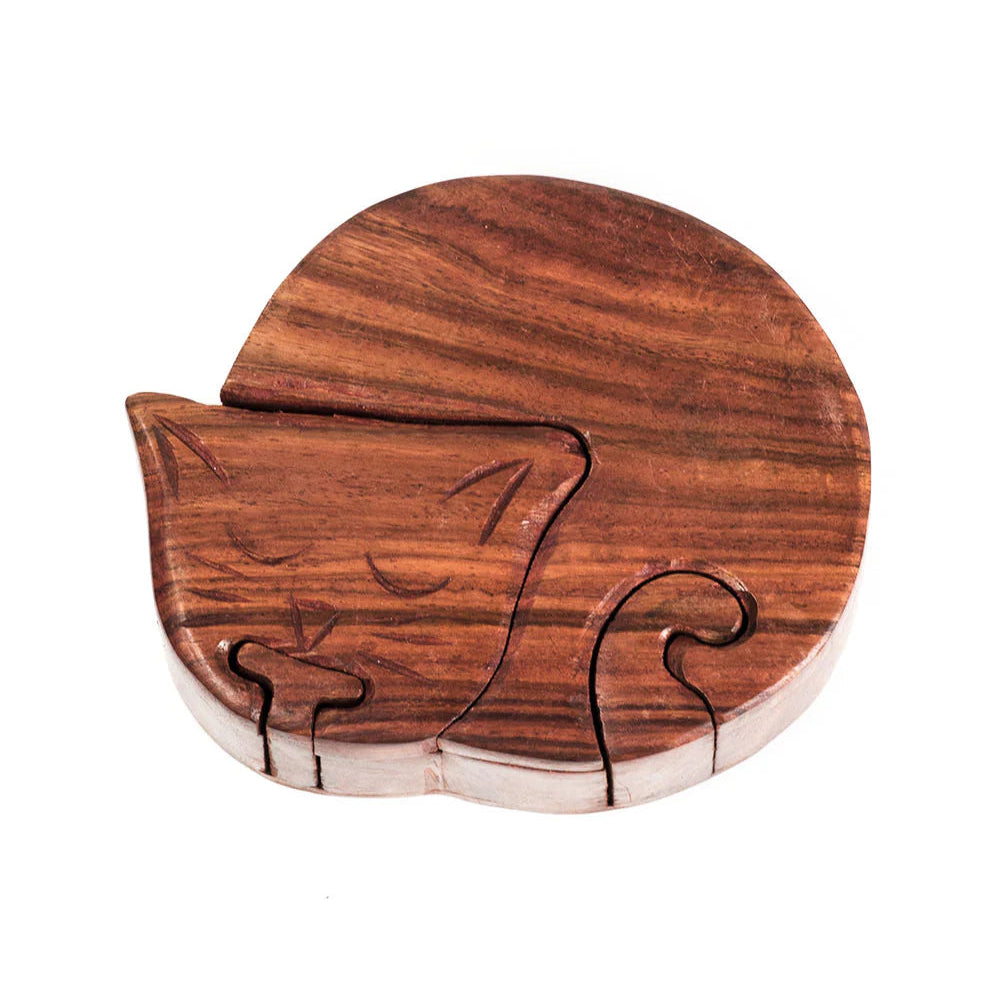 Wooden puzzle shaped like a cat on a white background